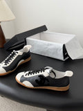 TRAINERS IN BLACK AND WHITE CALFSKIN AND EMBOSSED SUEDE